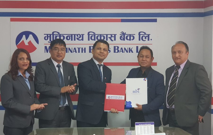 एनबीआई र मुक्तिनाथ  विकास बैंकबीच वित्तीय साक्षरता सम्झौता